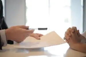 Someone Signing a loan