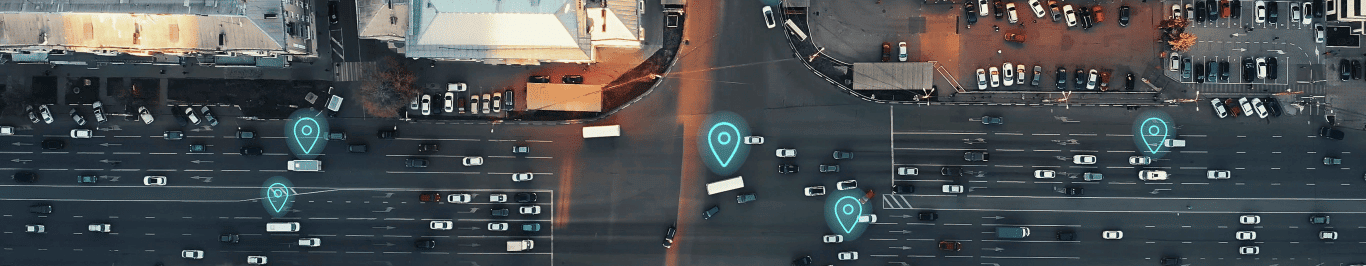 aerial view of city intersection with many cars and gps navigation system symbols. autonomous driverless vehicles in city traffic. future transportati min