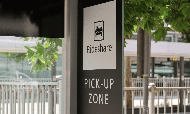 black and white rideshare pick up zone sign@2x min